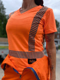 Chandail orange ou jaune à bandes réfléchissantes